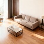 Sofá cinza limpo e livre de manchas após serviço de limpeza profissional ao domicílio no Algarve